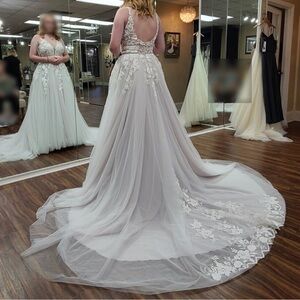 Perfect condition! Never worn! (Just tried on). Smokey lavender color!